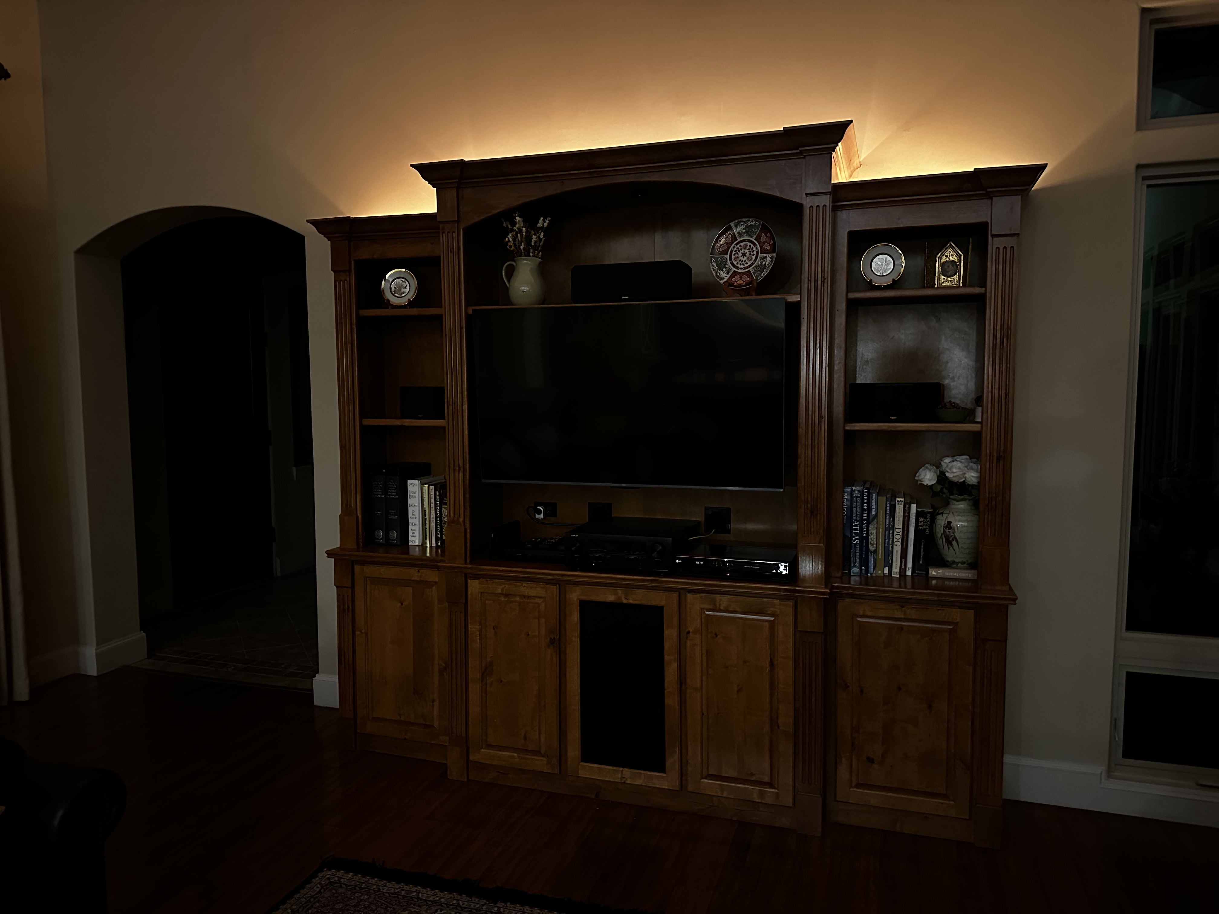 Custom home theater setup: surround sound, wall mounted TV